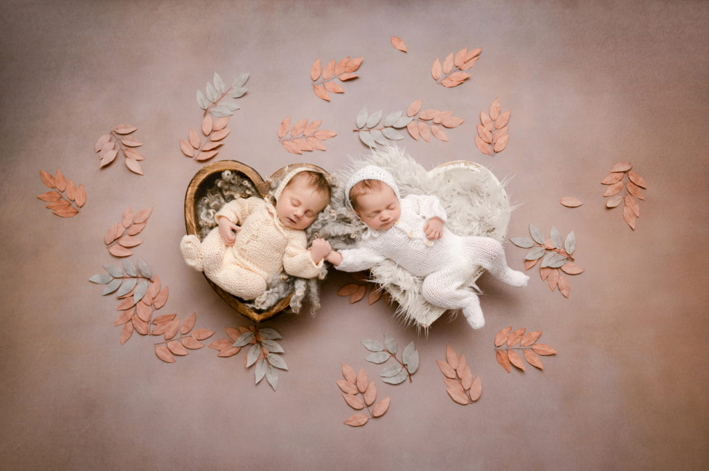 twin newborn portrait | babies holding hands | hearts | Keeping babies safe